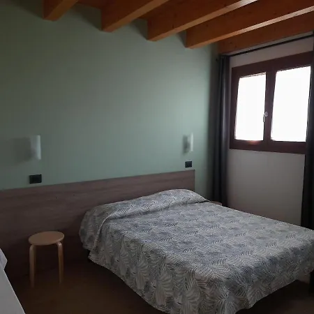 Ai Tre Fienili Lägenhetshotell *